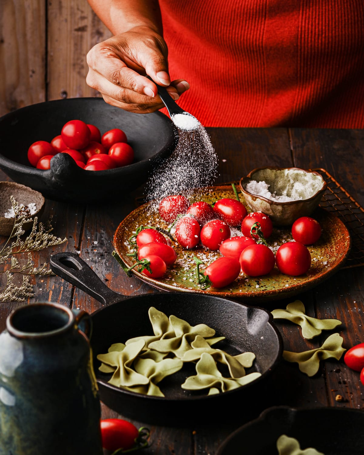 Food photography of cherry tomatoes and pasta