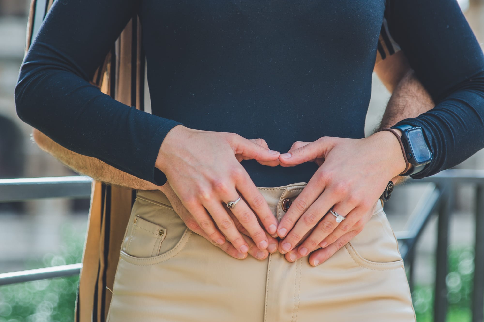 Couple showing the baby bump of the mother